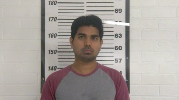 Store clerk fires at customer