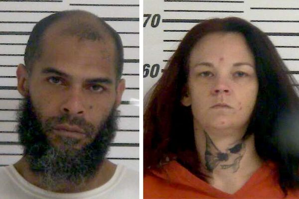 Couple arrested after hiding from law