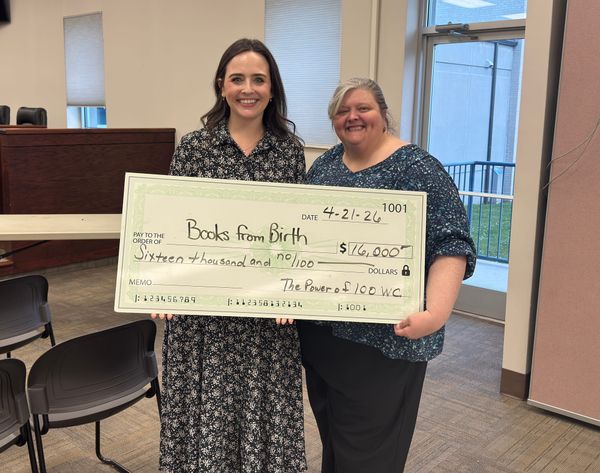 Power of 100 donates $16K to Books from Birth