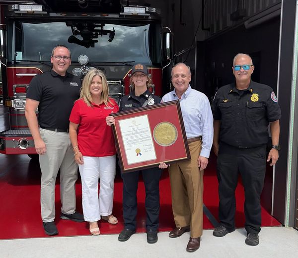 AEMT Firefighter Jade Callister Honored With Copy of First Responders Law