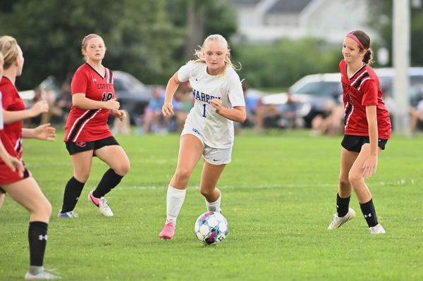 Lady Pioneers weather Coffee in opener
