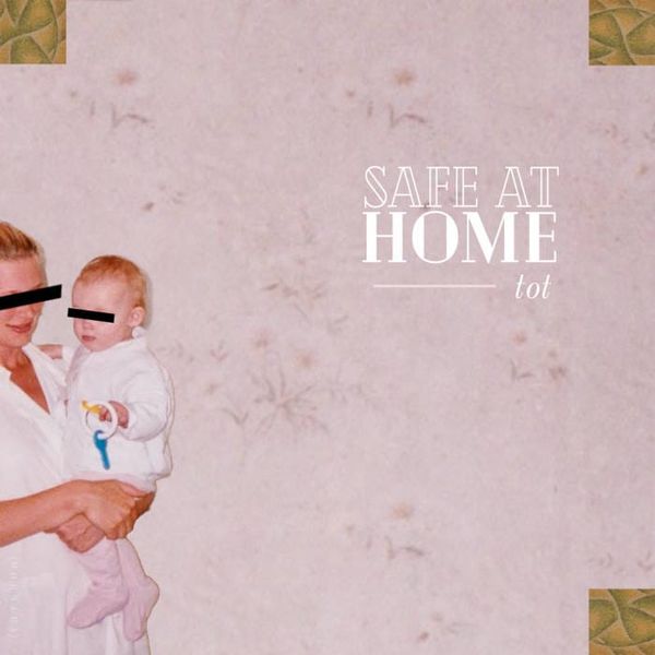 cover art for tot’s ep “safe at home (дома в безопасности)” – an adult holding a baby, both with black bars over their eyes.