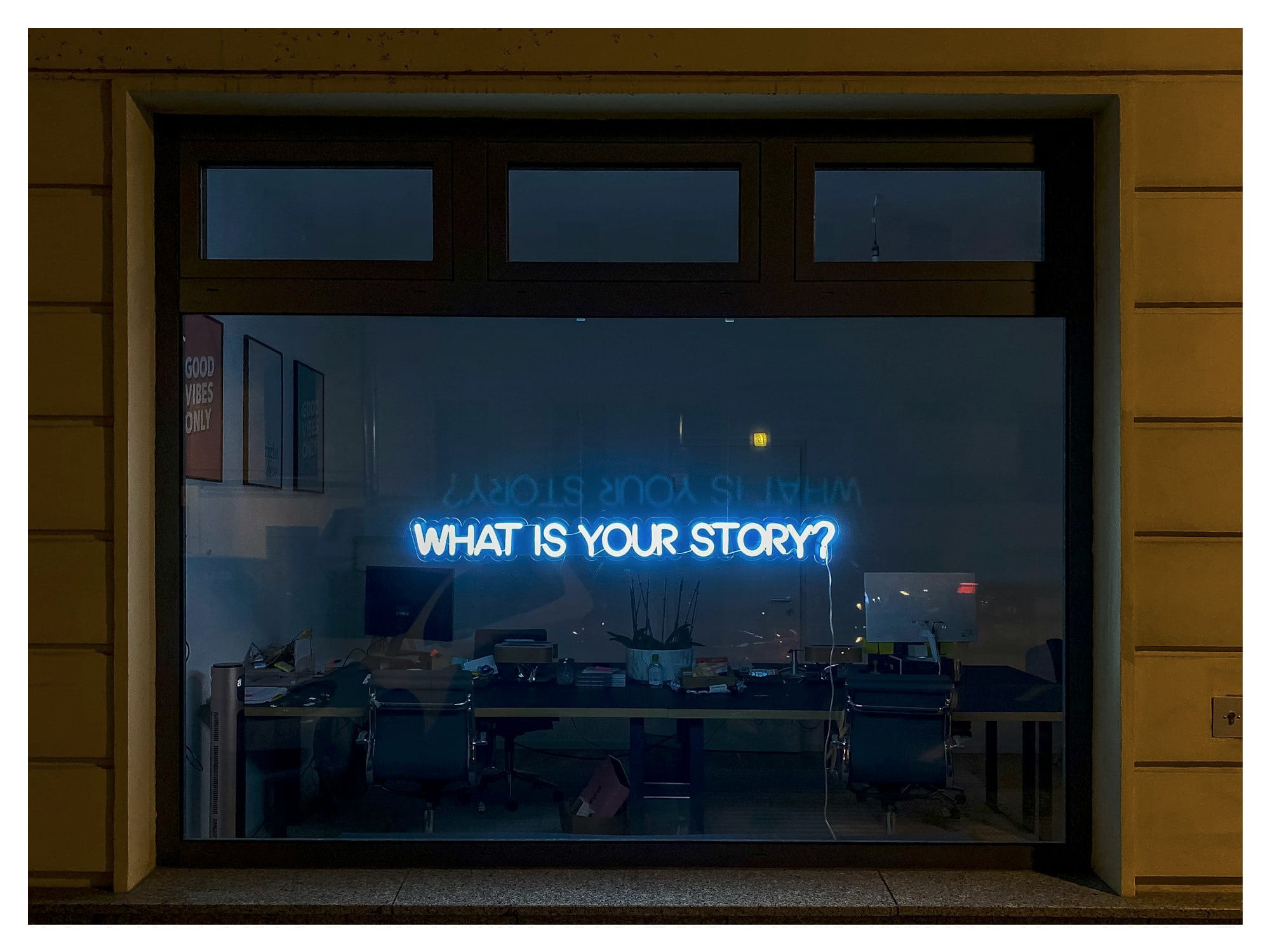 black flat screen tv turned on at the living room