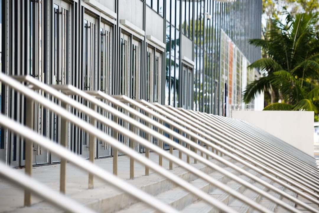 Exterior apartment stairwell and handrail at a Florida rental