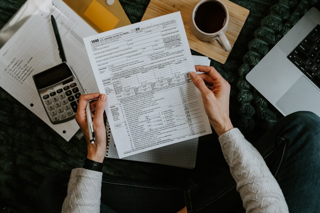 Investor reviewing rental property financing numbers at a desk