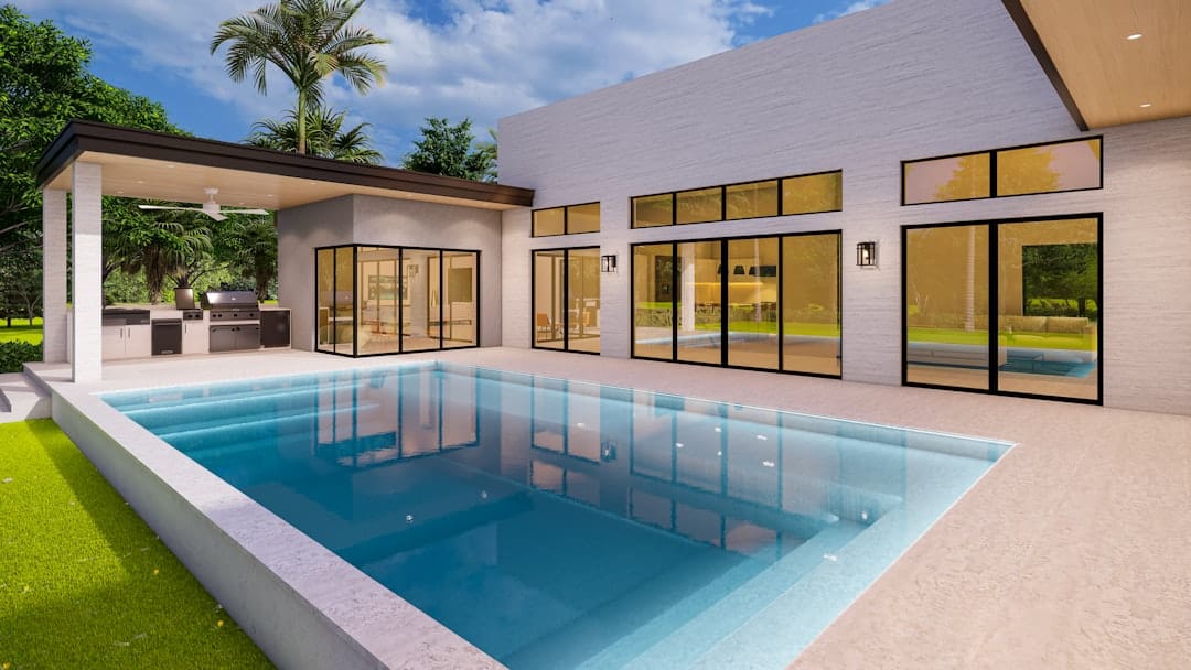 Screen-enclosed swimming pool behind a Florida single-family rental home