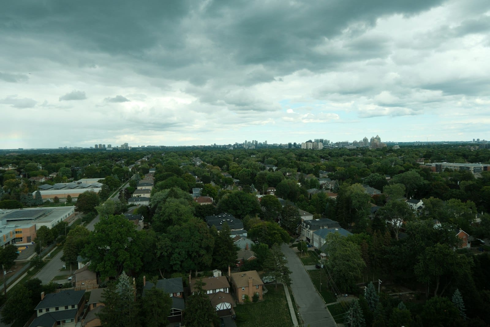 Storm clouds building over a Florida residential street