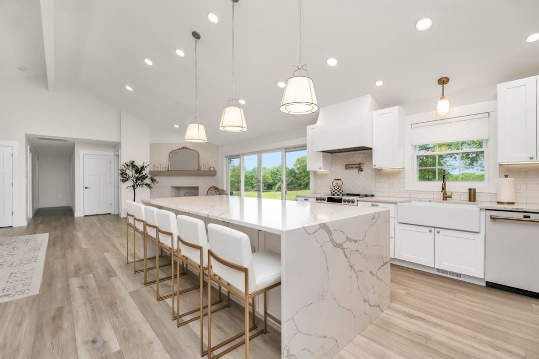 A bright, wide-angle photo of a clean rental kitchen, the kind of detailed image renters scrutinize most