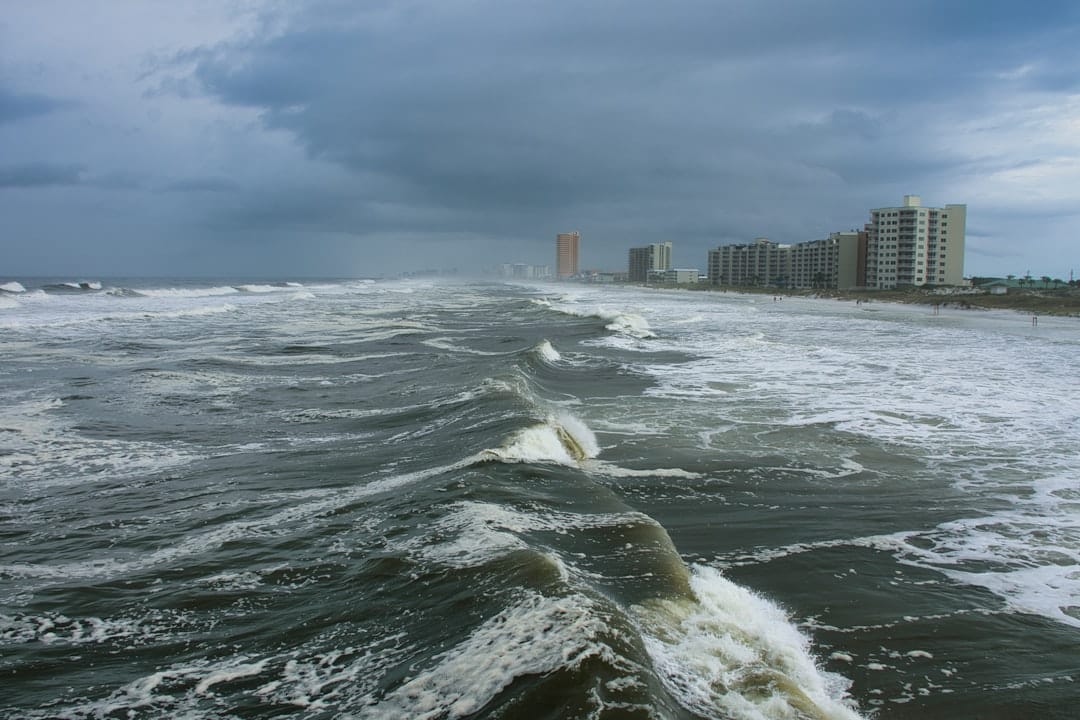 Waves along the Florida coast near city buildings