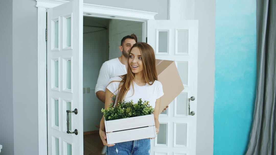 A military family with moving boxes settling into a rental home