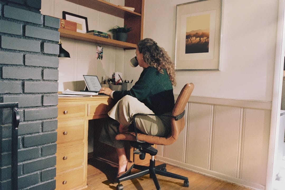 A landlord working through the numbers on what self-managing a rental actually costs