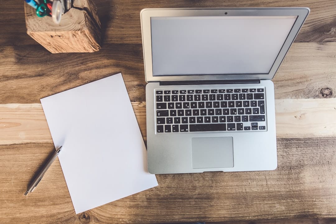 Rental paperwork and documents on a wooden desk