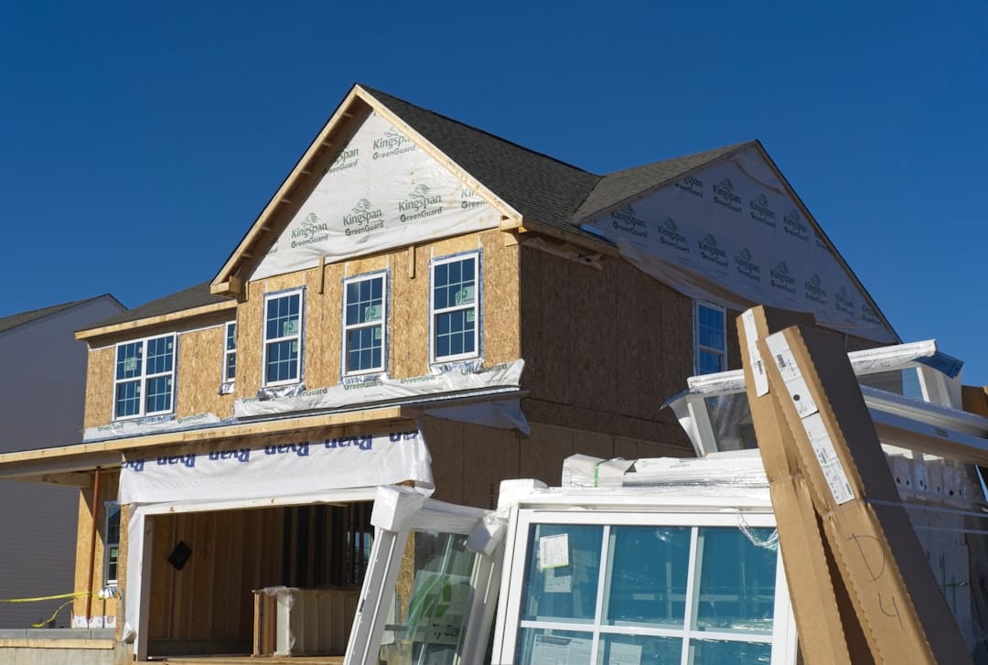 Building materials in front of a home under construction