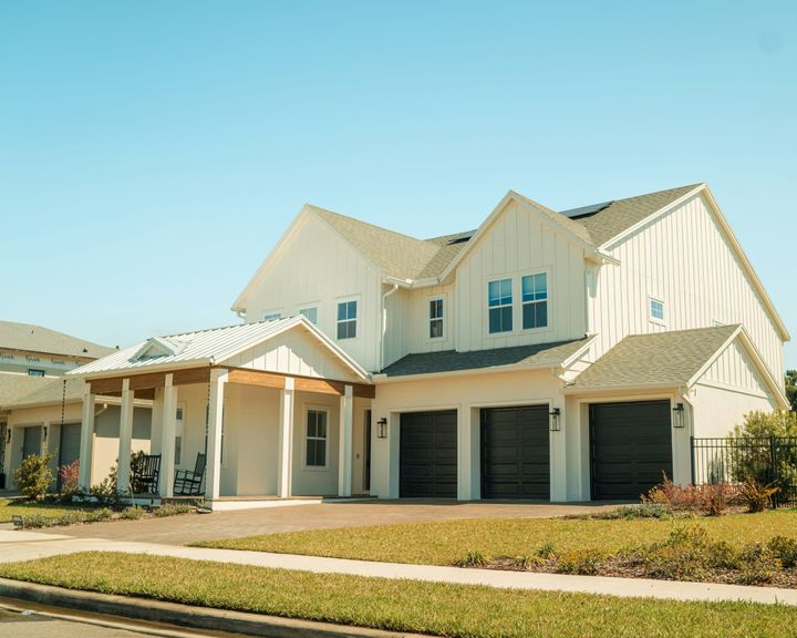 Large white house with two garages in Lake Nona, Florida