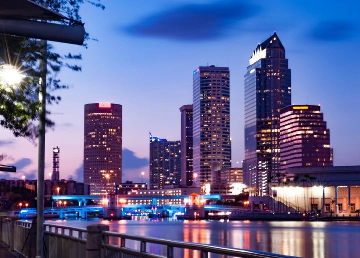 Aerial view of Tampa’s waterfront condos and marina at dusk