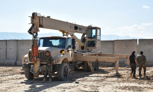 A soldier training in the Afghan National Army Engineering School prepares a crane during the construction of the ScanEagle launch and recovery site in Mazar-e Sharif. ScanEagle systems provide the Afghan National Army with airborne intelligence, surveillance and reconnaissance capability. Combined Security Transition Command-Afghanistan’s ISR Capabilities Integration Cell is training, advising and assisting the Afghan National Army on how to best utilize this technology. In addition to the ScanEagle training site in Mazar-e Sharif, a system is operational in Helmand. Six more sites will be constructed throughout Afghanistan in the next two and half years. (Courtesy photo by David Davenport/Released) 