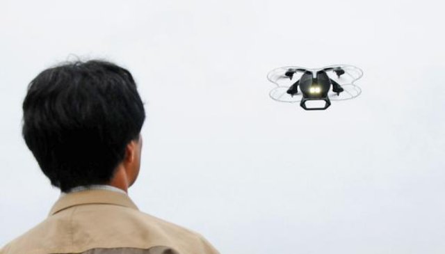 The drone detects the target's direction and follows at a distance.