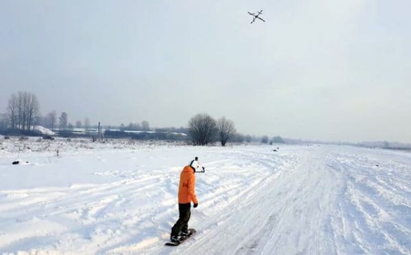 Droneboarding - Snowboarder Towed by a Drone