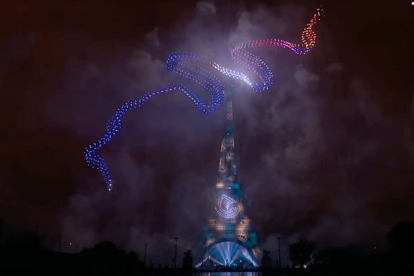 Drones and Fireworks Light Up the Eiffel Tower on Bastille Day in Paris