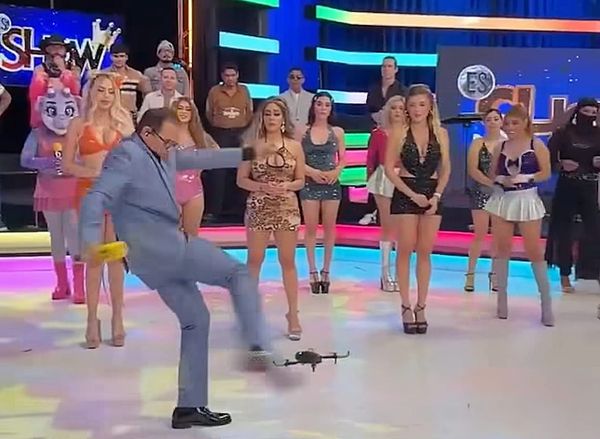 TV Host Boots Drone Into Model's Face