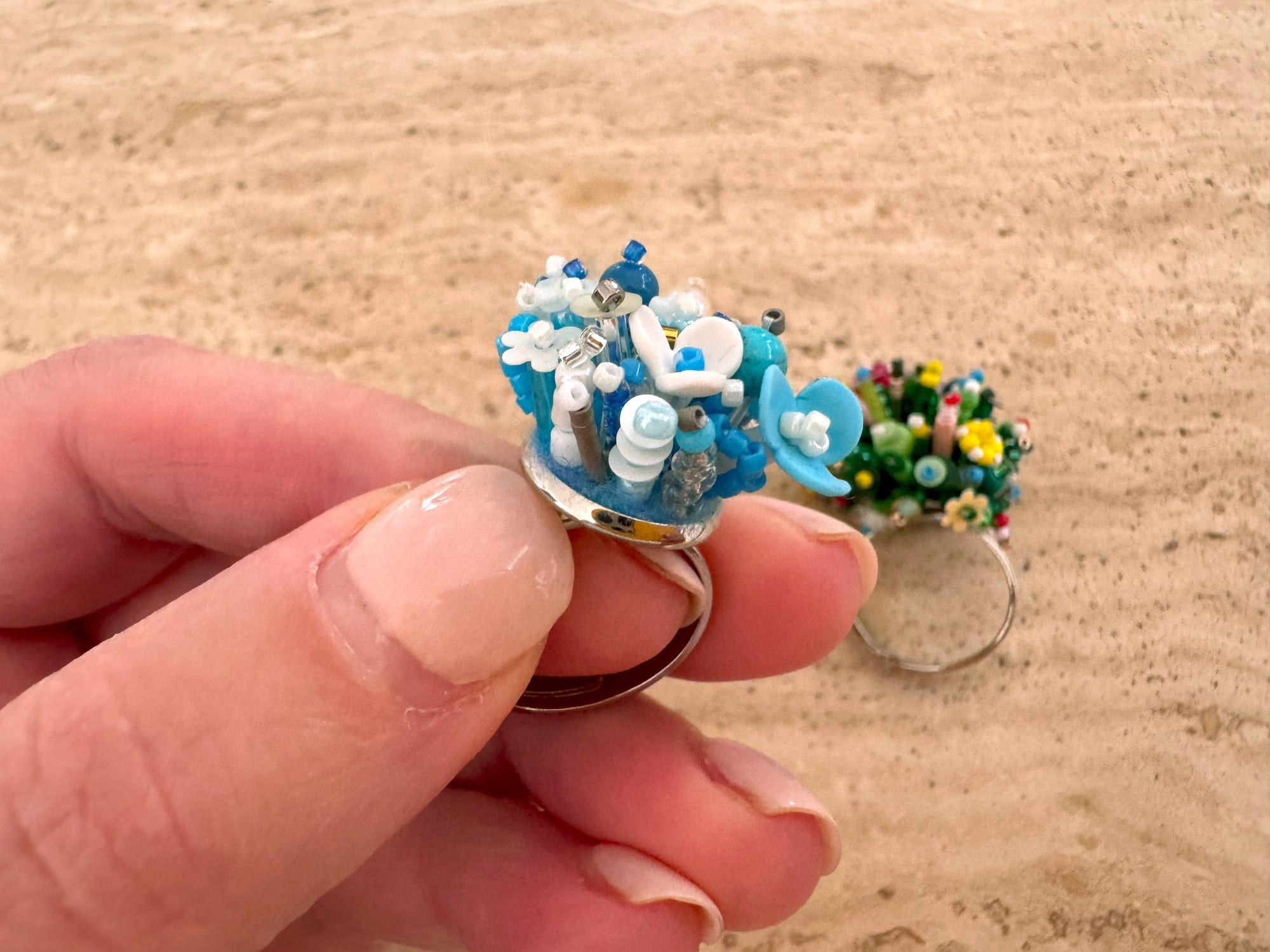 The 3D-beaded unfinished ring requires more elements to be added