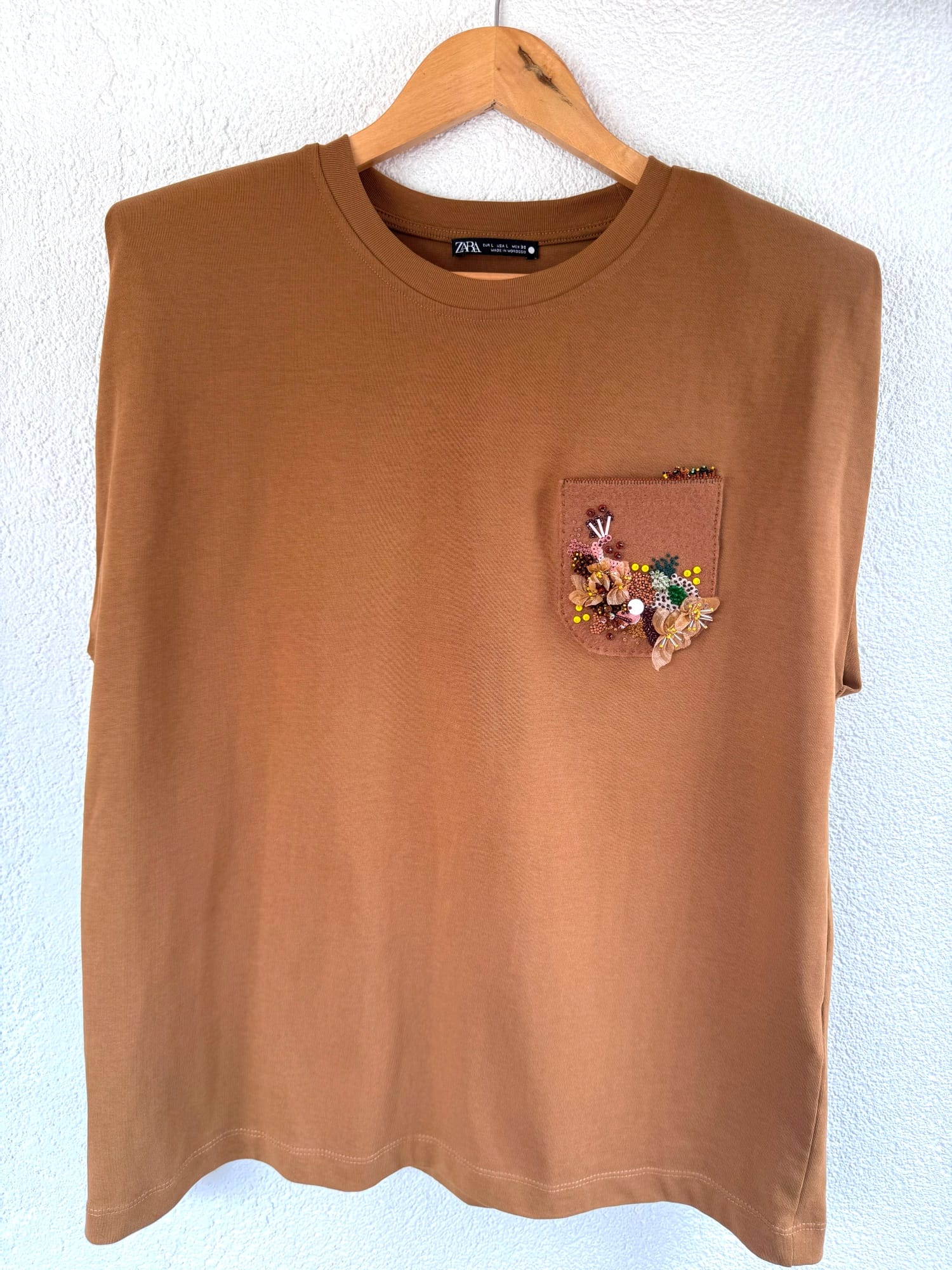 Summer blouse customized with an embellished pocket