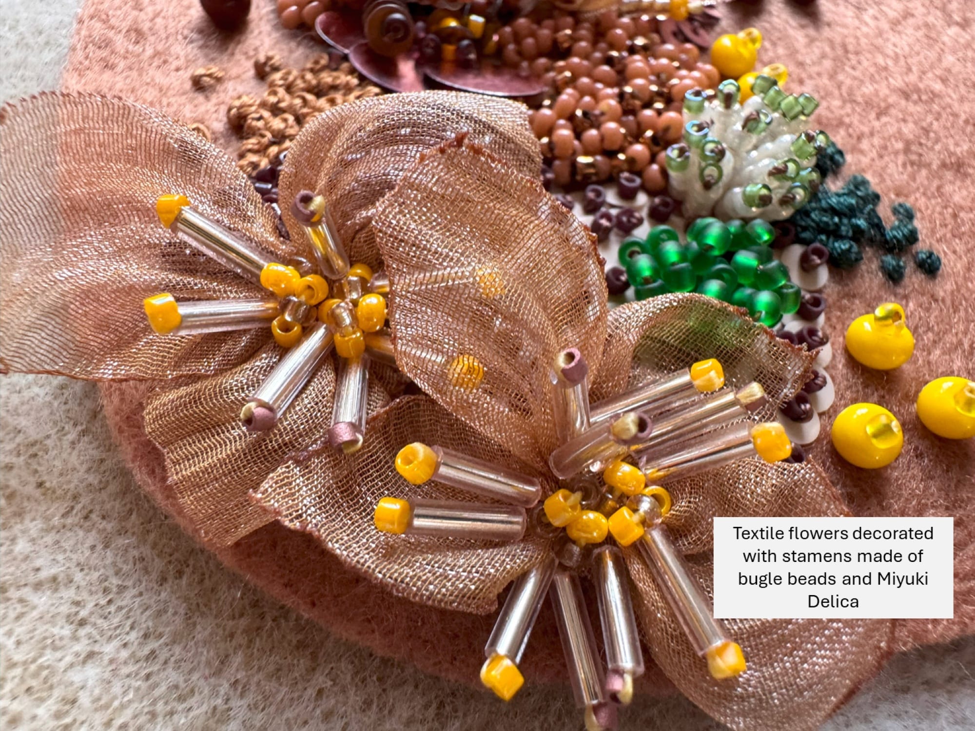 Fabric flowers decorated with stamens made from beads