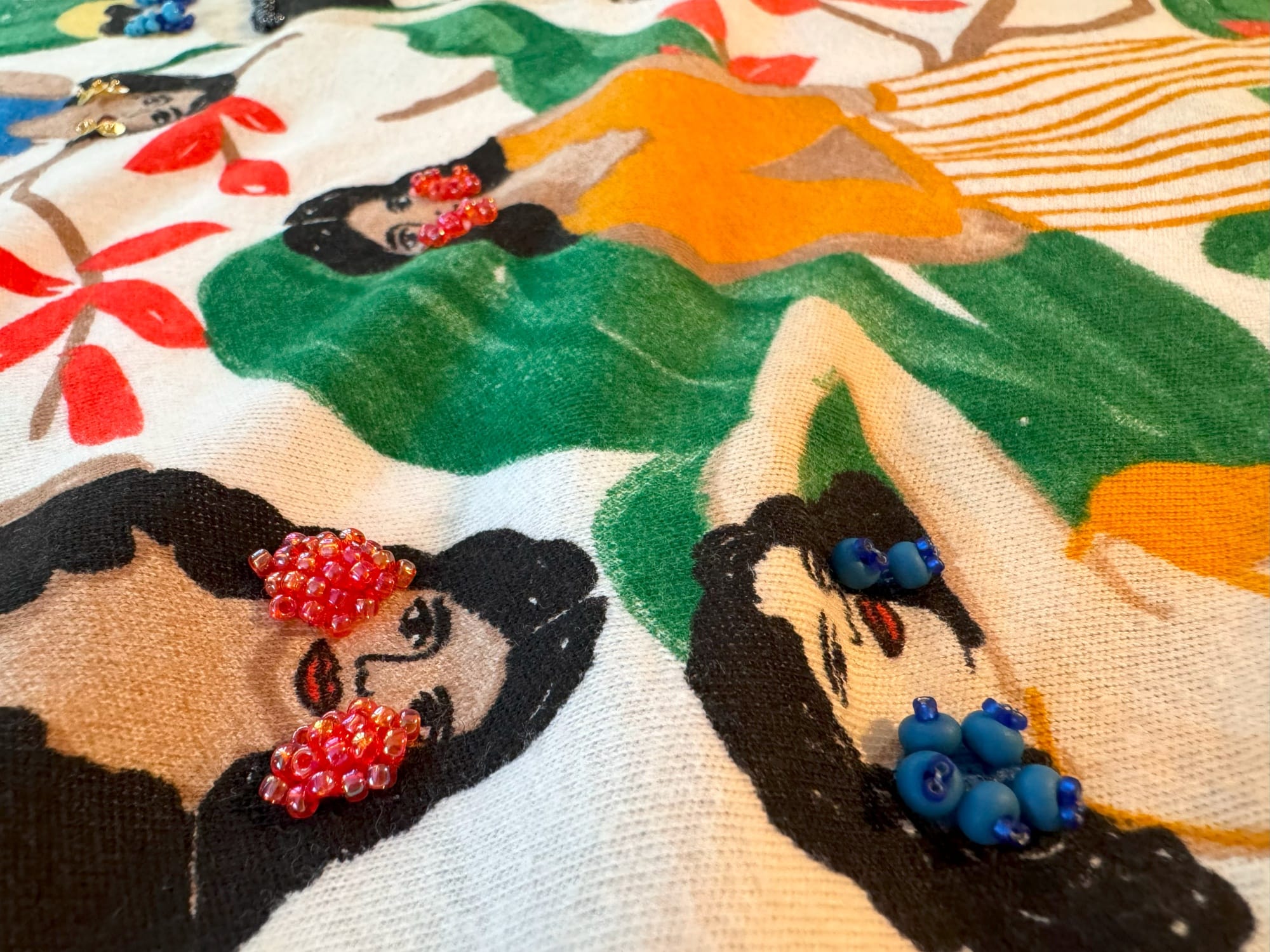 Earrings made from 10\0 size orange Toho beads and a combination of 8\0 and 15\0 sizes Toho beads