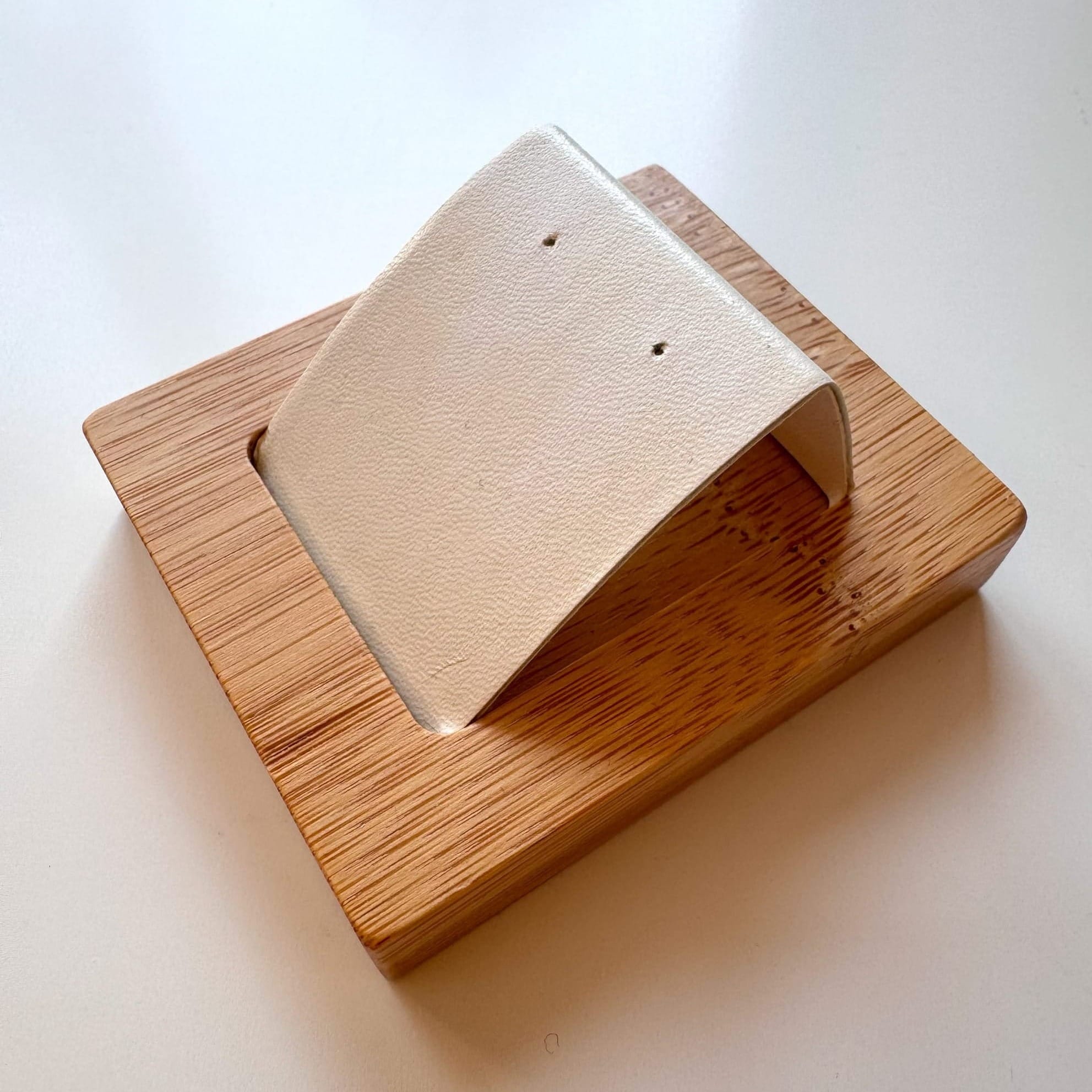 Wooden stand for stud earrings with light beige insert