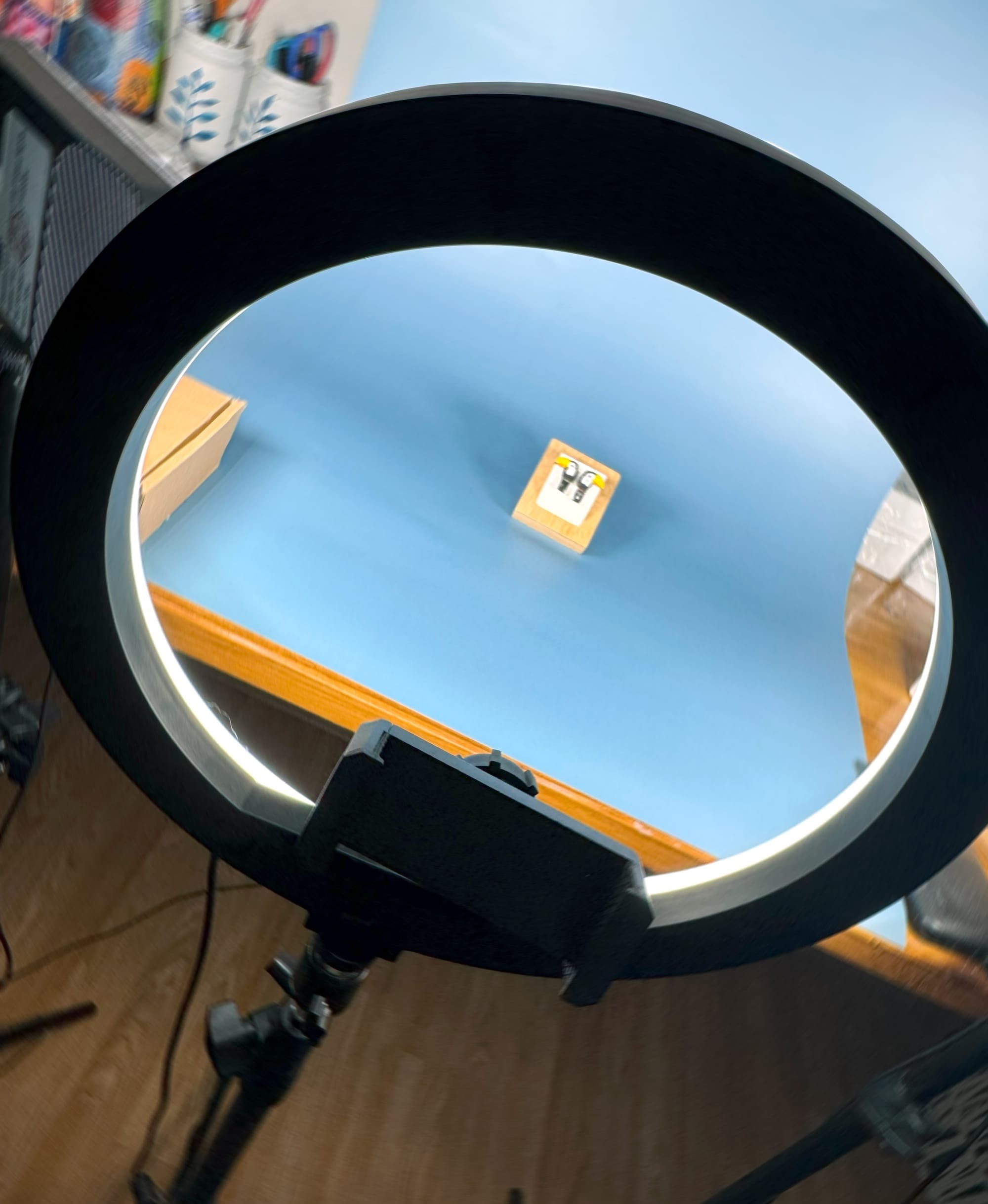 Earrings photo shooting stage with light and phone holder.