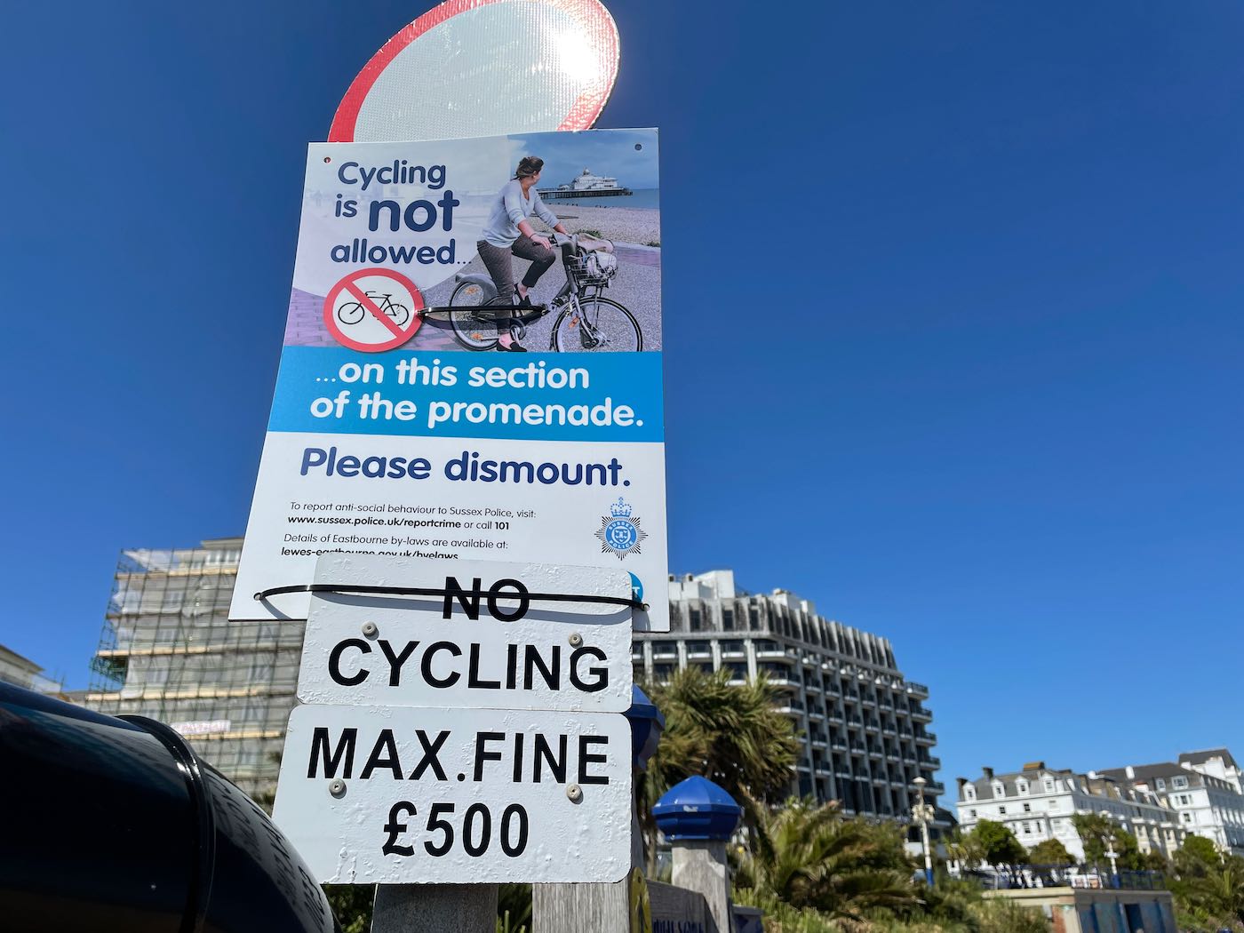 Sign warning of a £500 fine for Eastbourne seafront cycling