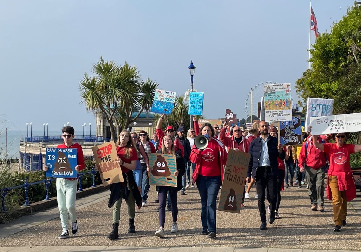 Coast lovers join sea swimmers in sewage protest march