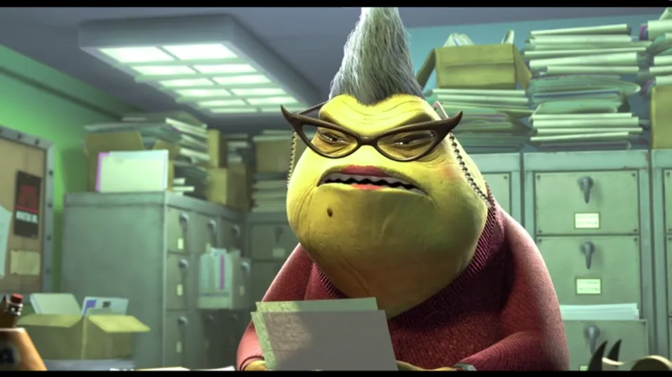 A still from Monsters Inc. showing Roz in her office.