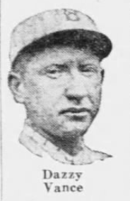 1926 newspaper box score showing the St. Louis Cardinals defeating the Brooklyn Robins 4–0 at Ebbets Field. The box score includes batting and fielding statistics, inning-by-inning scoring, and notes Jim Bottomley's home run, Bill Sherdel's complete-game shutout, and Dazzy Vance's nine strikeouts despite the loss.