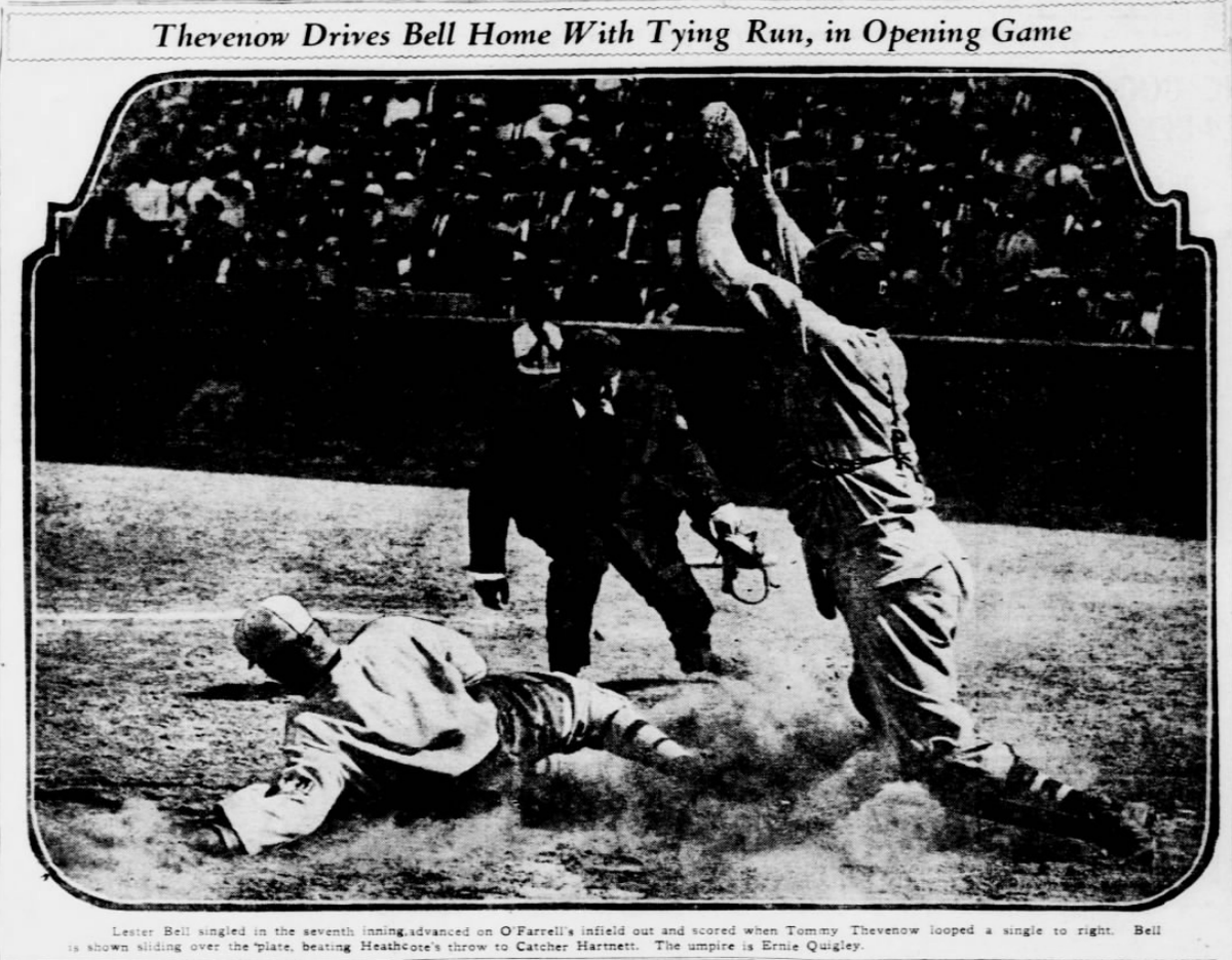 Lester Bell slides home safely on Tommy Thevenow's game-tying single as Cubs catcher Gabby Hartnett awaits the throw during the Cardinals-Cubs doubleheader at Sportsman's Park, June 27, 1926.