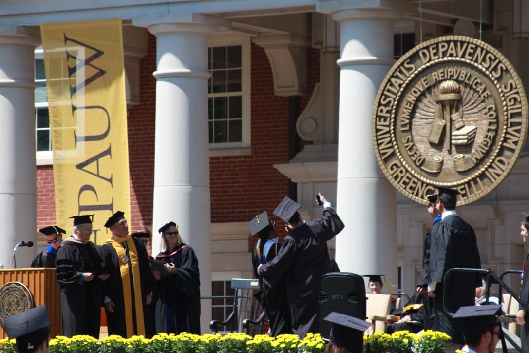 Rob Weidner DePauw Class of 2014 with commencement speaker and actor Kal Penn.