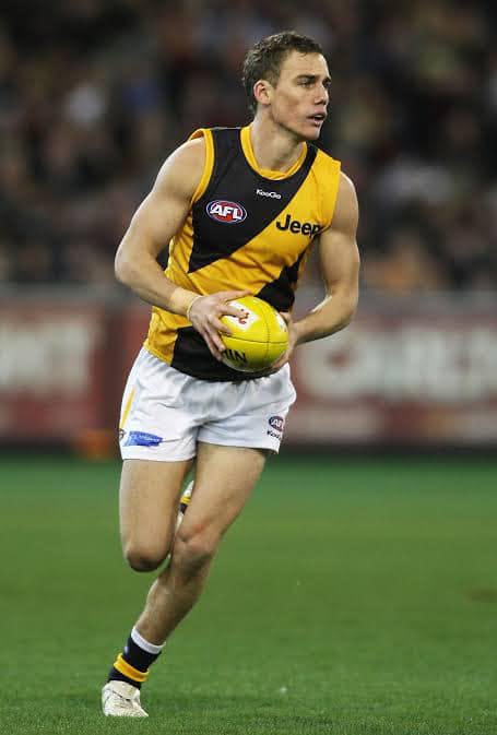 Magpies swoop to sign Helbig