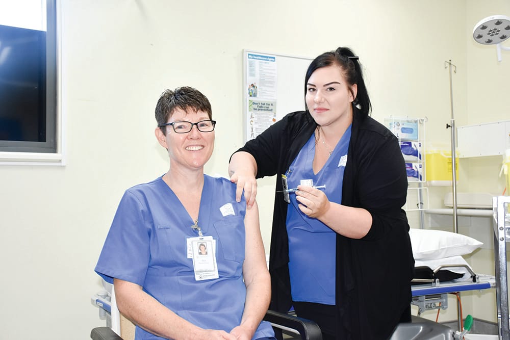 LINE UP: Local doctors start giving COVID jabs