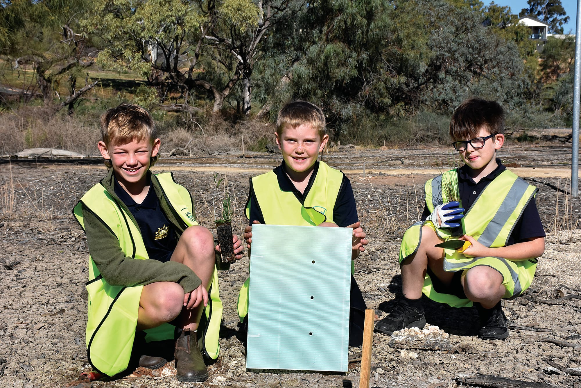 Local students help re-plant floodplain