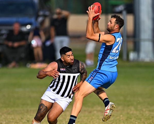 Roos survive Magpie scare