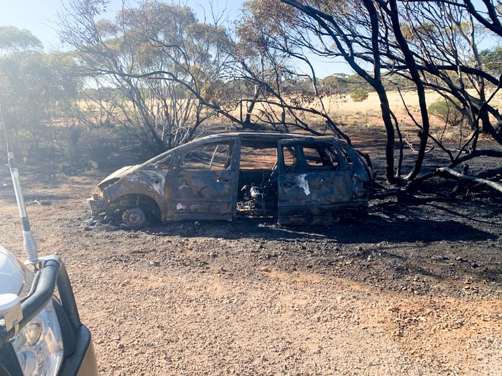 Car fire burns scrublands