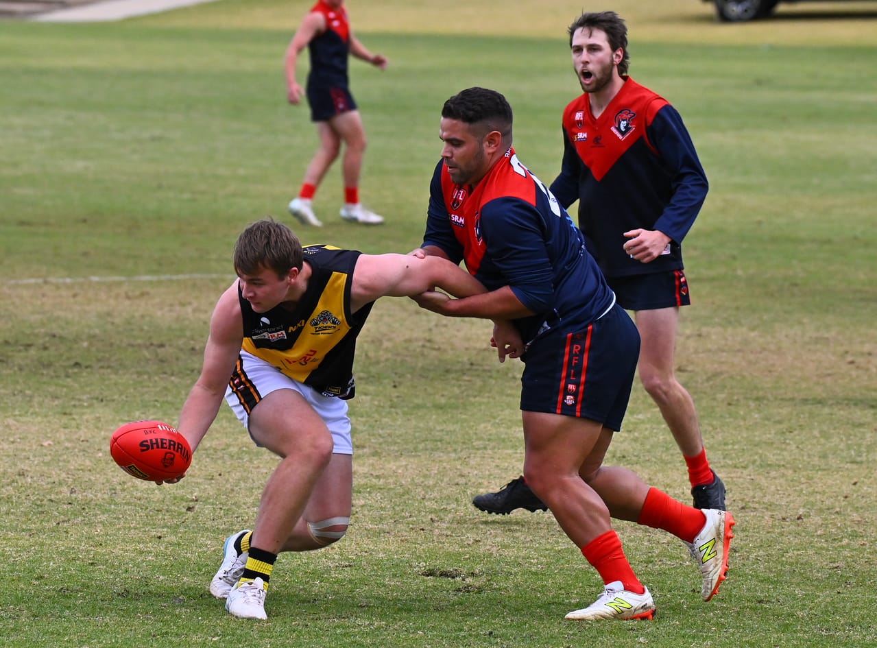 Demons hit the top four