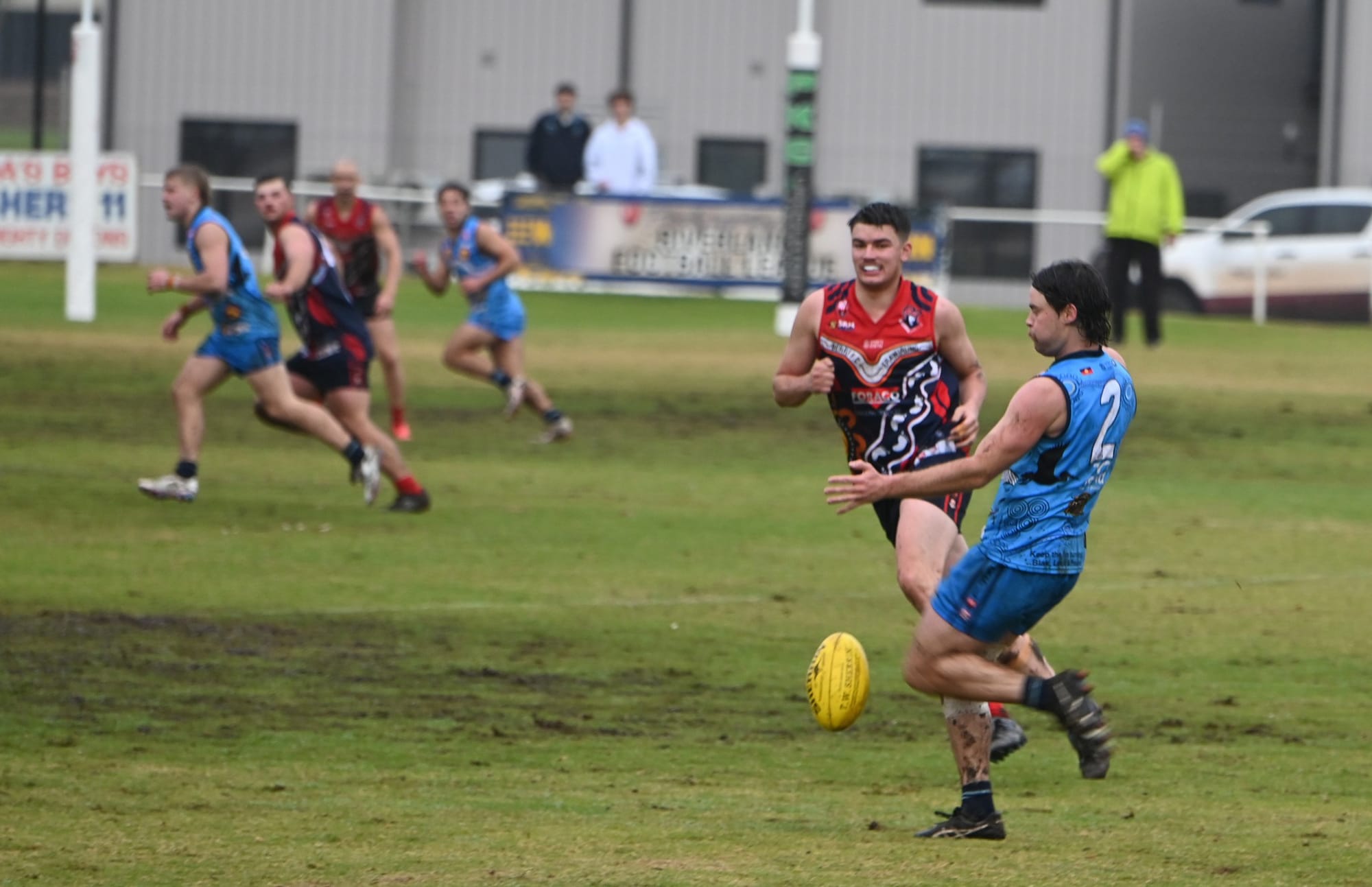 Roos strangle Demons in rivalry clash