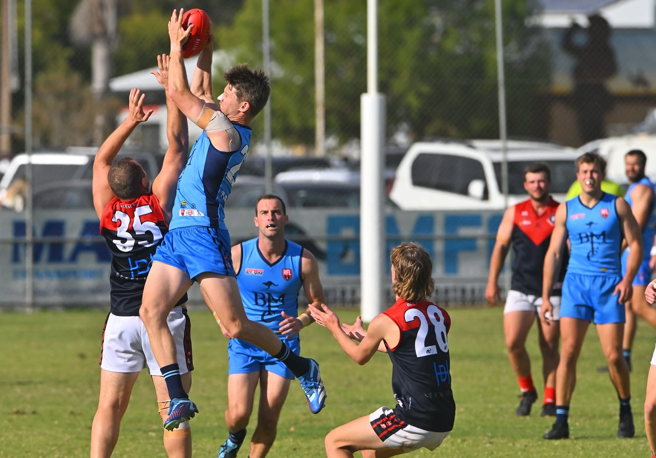 Roos bounce past arch rivals