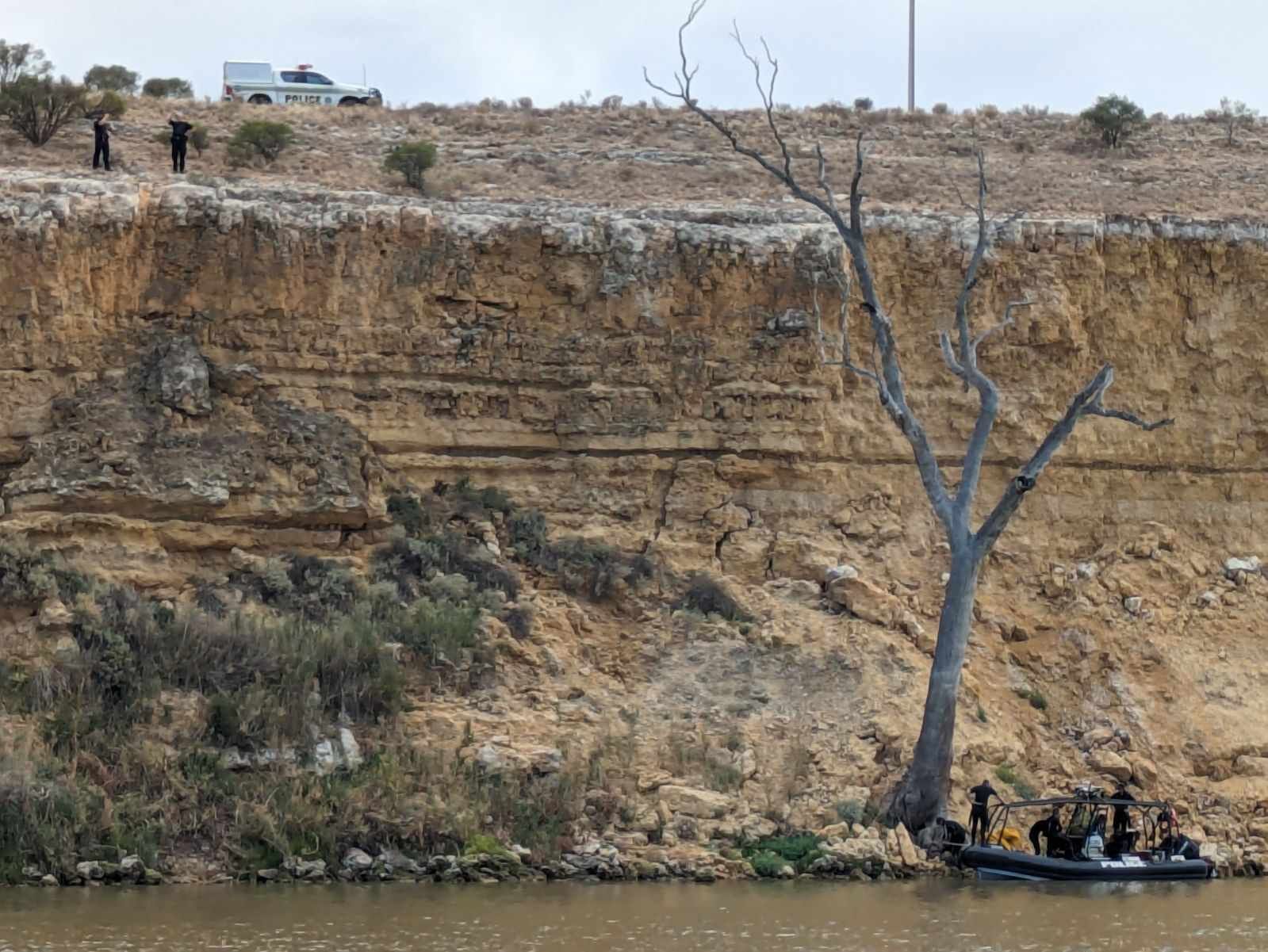 Vehicle rolls over cliff at Taylorville