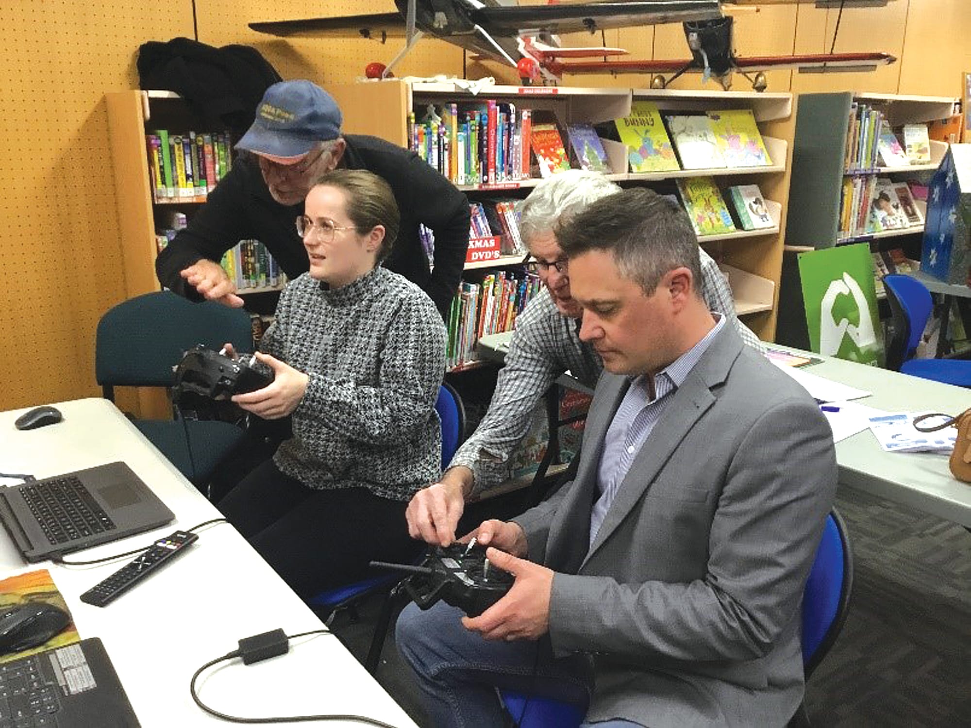 Council duo takes flight in library