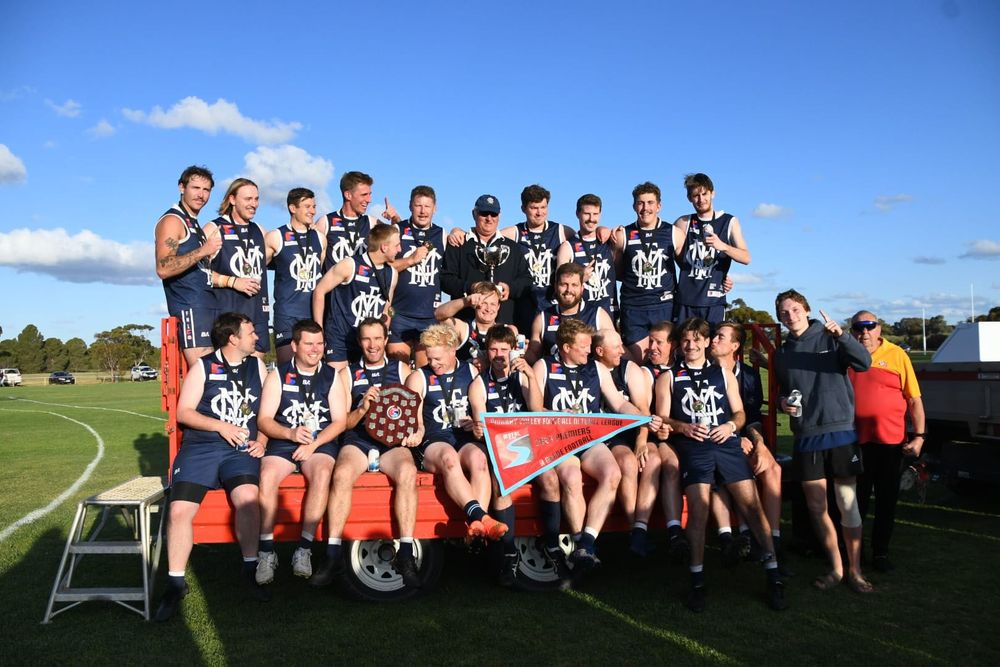 Footy premiers change coach post image