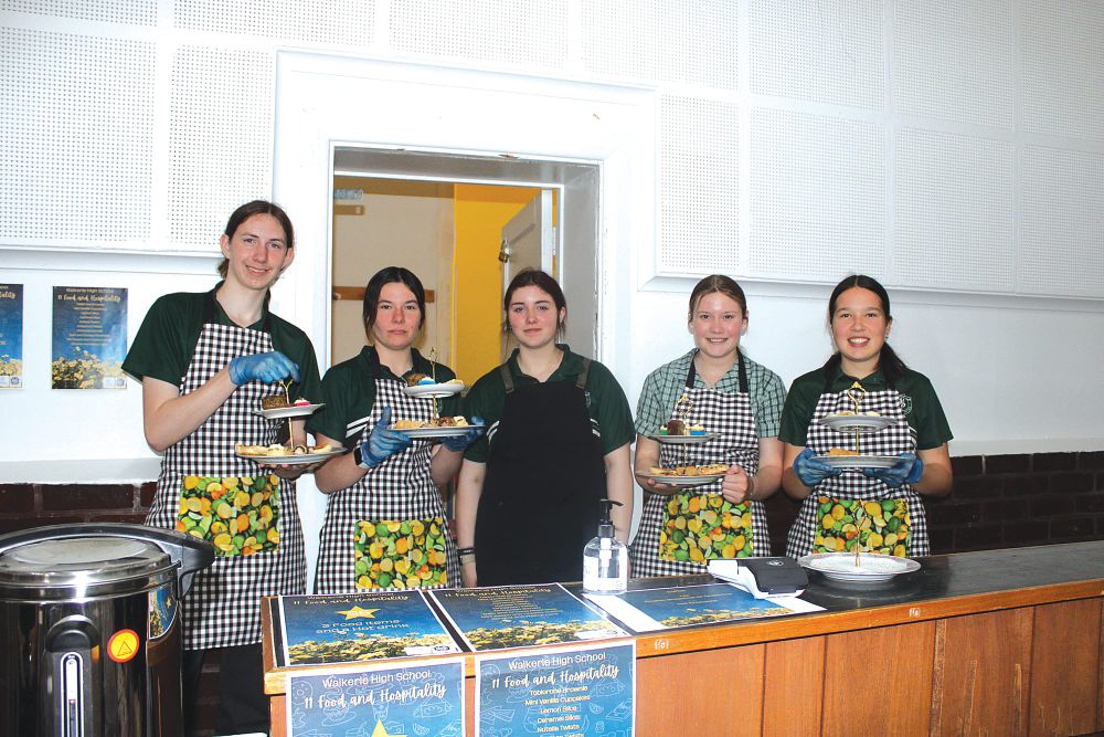 Local students serve flower show high teas post image