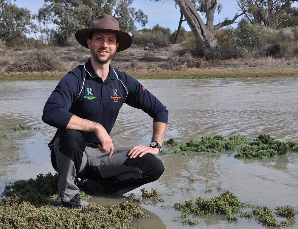 Myles beaming about bend watering post image
