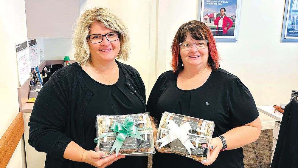 Local bankers help couple avoid scam post image